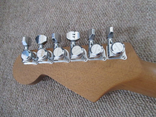Ratio tuners - each tuner has a different gear ratio, so all strings tune easily.