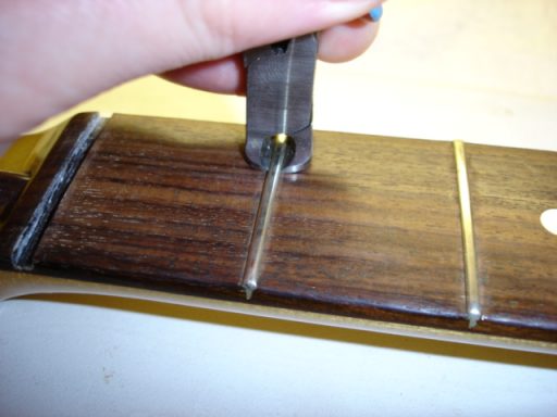 Fret removal